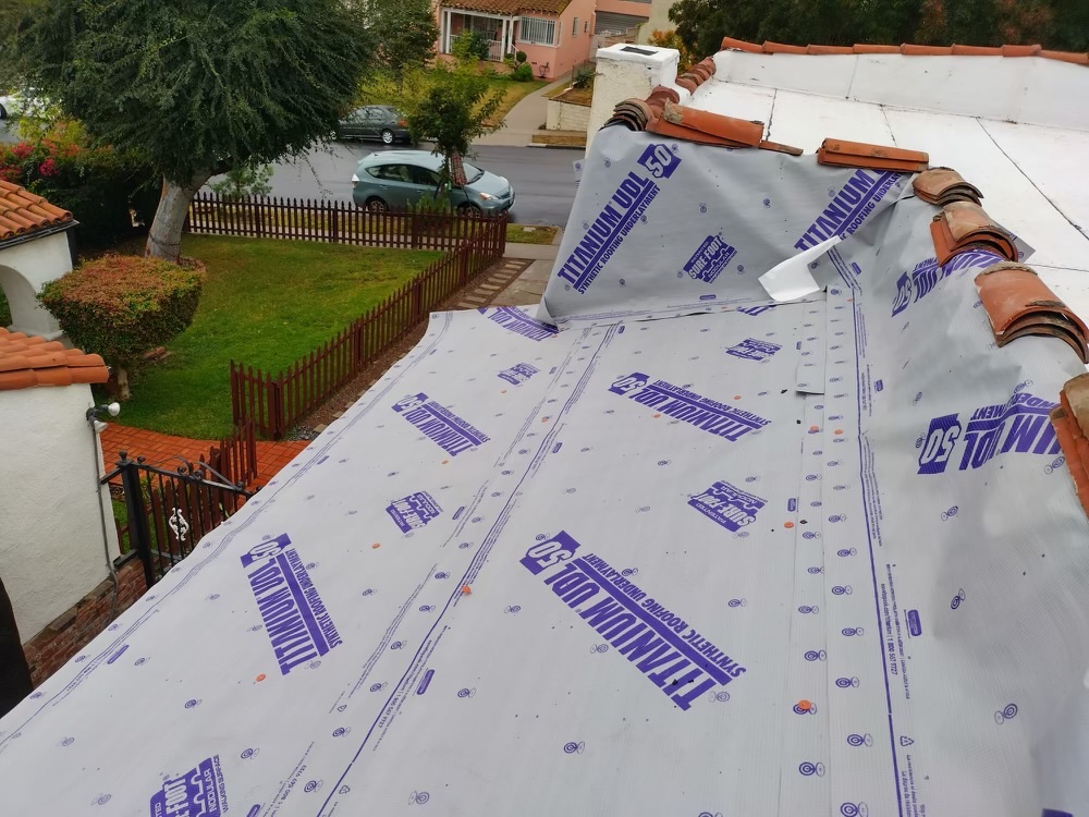 New underlayment for tile roof and polyfresko flat roof on this reroof in Silverlake